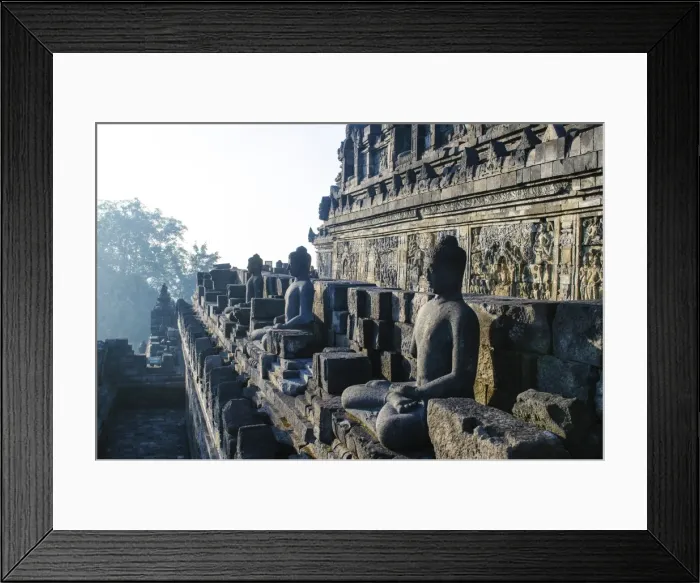 Framed Print : Early morning light shining on Buddhas sitting in the temple complex of Borobodur, UNESCO World Heritage Site, Java, Indonesia, Southeast Asia, Asia Framed Print : Early morning light shining on Buddhas sitting in the temple complex of Borobodur, UNESCO World Heritage Site, Java, Indonesia, Southeast Asia, Asia