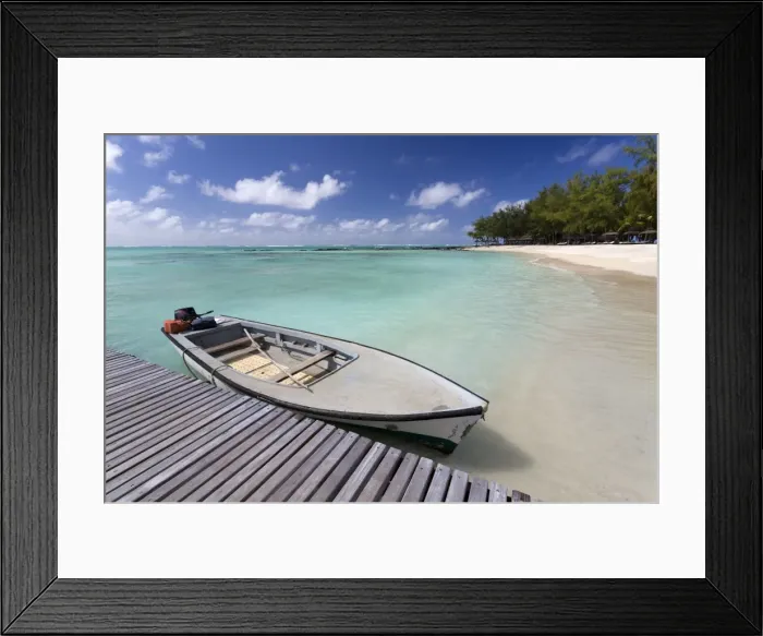 Framed Print : Wooden jetty with a boat tied to it, stretching out into the Indian Ocean off an idyllic beach on Ile Aux Cerfs, Mauritius, Indian Ocean, Africa Framed Print : Wooden jetty with a boat tied to it, stretching out into the Indian Ocean off an idyllic beach on Ile Aux Cerfs, Mauritius, Indian Ocean, Africa