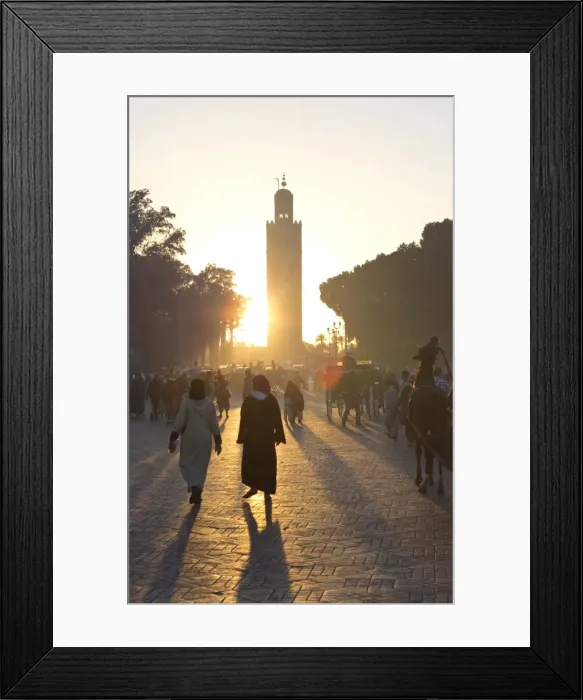 Framed Print : View towards the Koutoubia Minaret at sunset with local people walking through the scene, Djemaa el Fna, Marrakech, Morocco, North Africa, Africa Framed Print : View towards the Koutoubia Minaret at sunset with local people walking through the scene, Djemaa el Fna, Marrakech, Morocco, North Africa, Africa