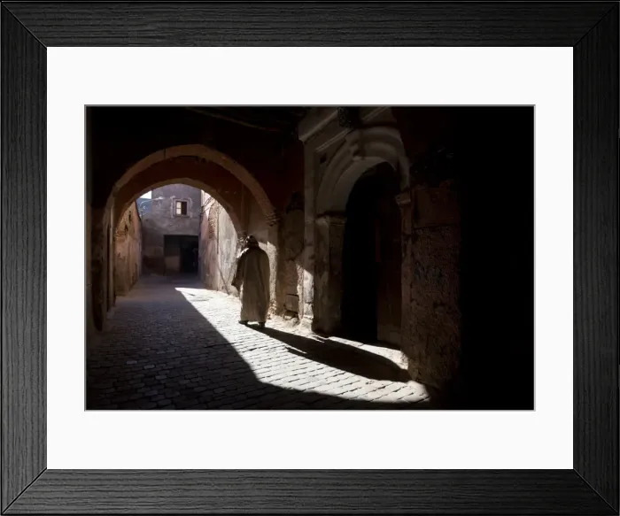 Framed Print : Local man wearing a djellaba casting a long shadow in a sunlit street in the Kasbah, Marrakech, Morocco, North Africa, Africa Framed Print : Local man wearing a djellaba casting a long shadow in a sunlit street in the Kasbah, Marrakech, Morocco, North Africa, Africa