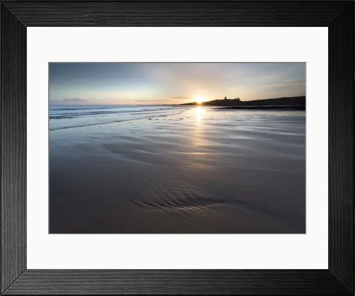 Framed Print : View over Embleton Beach at sunrise towards the silhouetted ruin of Dunstanburgh Castle in the distance, Embleton Bay, near Alnwick, Northumberland, England, United Kingdom, Europe Framed Print : View over Embleton Beach at sunrise towards the silhouetted ruin of Dunstanburgh Castle in the distance, Embleton Bay, near Alnwick, Northumberland, England, United Kingdom, Europe