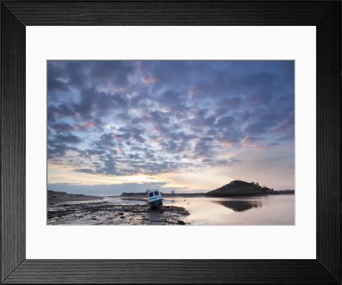 Framed Print : View towards Church Hill and the Aln Estuary during a stunning winter sunrise from the beach at low tide with a fishing boat in the foreground, Alnmouth, near Alnwick, Northumberland, England, United Kingdom, Europe