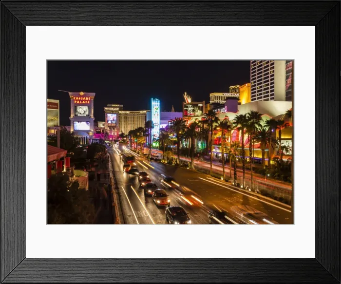 Framed Print : Neon lights, Las Vegas Strip at night with cars leaving light streaks in front of Caesars, Mirage and Flamingo, Las Vegas, Nevada, United States of America, North America Framed Print : Neon lights, Las Vegas Strip at night with cars leaving light streaks in front of Caesars, Mirage and Flamingo, Las Vegas, Nevada, United States of America, North America