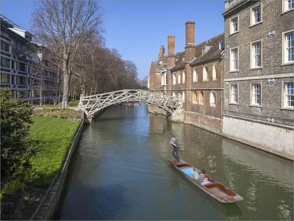 Mathematical Bridge, connecting two parts of Queens College, with punters on the river beneath, Cambridge, England, United Kingdom, Europe
