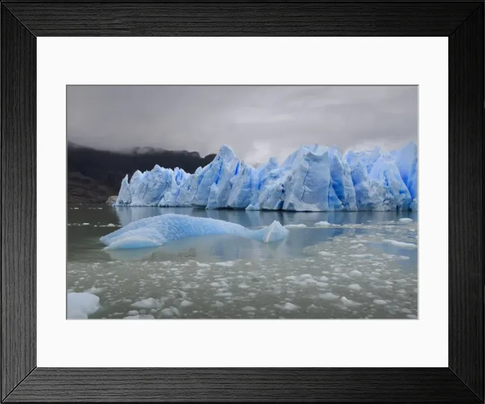 Framed Print : Lake-level view of blue ice at the glacier face and iceberg, Grey Glacier, Torres del Paine National Park, Patagonia, Chile, South America Framed Print : Lake-level view of blue ice at the glacier face and iceberg, Grey Glacier, Torres del Paine National Park, Patagonia, Chile, South America