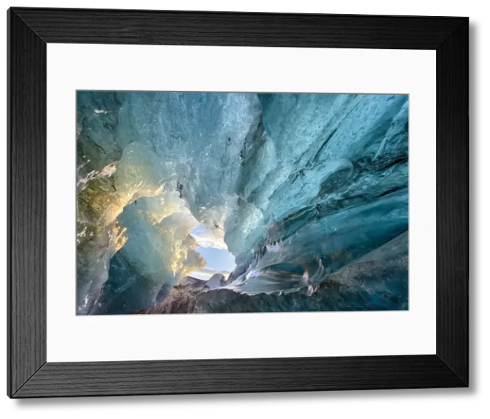 Framed Print : View inside an ice cave under the south Vatnajokull Glacier, captured at sunrise during winter when the ice caves are accessible, near Jokulsarlon, Southern Iceland, Iceland, Polar Regions Framed Print : View inside an ice cave under the south Vatnajokull Glacier, captured at sunrise during winter when the ice caves are accessible, near Jokulsarlon, Southern Iceland, Iceland, Polar Regions