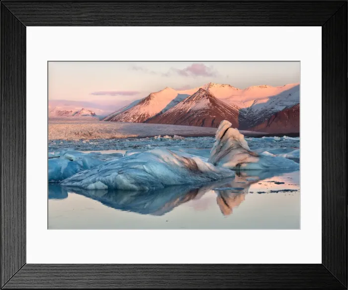 Framed Print : View across the calm water of Jokulsarlon glacial lagoon towards snow-capped mountains and icebergs bathed in winter morning light, at the head of the Breidamerkurjokull Glacier on the edge of the Vatnajokull National Park, South Iceland, Iceland, Polar Regions Framed Print : View across the calm water of Jokulsarlon glacial lagoon towards snow-capped mountains and icebergs bathed in winter morning light, at the head of the Breidamerkurjokull Glacier on the edge of the Vatnajokull National Park, South Iceland, Iceland, Polar Regions