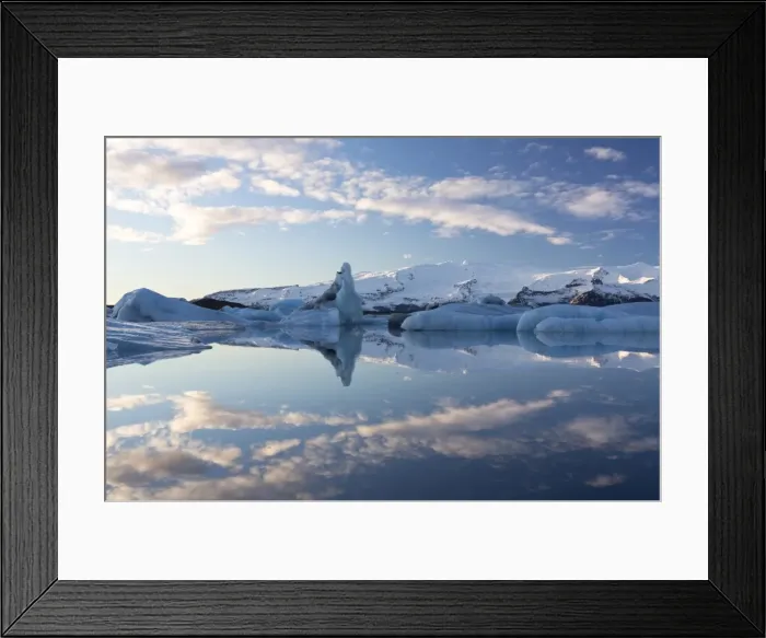 Framed Print : View over Jokulsarlon, a glacial lagoon at the head of the Breidamerkurjokull Glacier, towards icebergs and snow-capped mountains, with reflections in the calm water of the lagoon on a winters afternoon, on the edge of the Vatnajokull National Park, South Iceland, Iceland, Polar Regions Framed Print : View over Jokulsarlon, a glacial lagoon at the head of the Breidamerkurjokull Glacier, towards icebergs and snow-capped mountains, with reflections in the calm water of the lagoon on a winters afternoon, on the edge of the Vatnajokull National Park, South Iceland, Iceland, Polar Regions