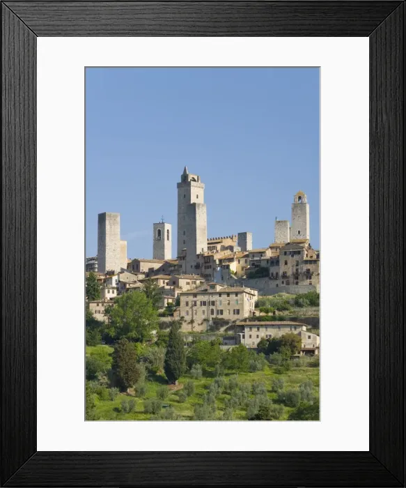 Framed Print : View across field to typical houses and medieval towers, San Gimignano, UNESCO World Heritage Site, Siena, Tuscany, Italy, Europe Framed Print : View across field to typical houses and medieval towers, San Gimignano, UNESCO World Heritage Site, Siena, Tuscany, Italy, Europe