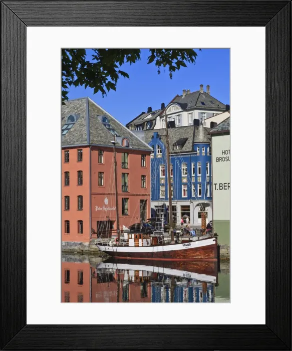 Framed Print : Art Nouveau buildings and reflections with boat, Alesund, More og Romsdal, Norway, Scandinavia, Europe Framed Print : Art Nouveau buildings and reflections with boat, Alesund, More og Romsdal, Norway, Scandinavia, Europe