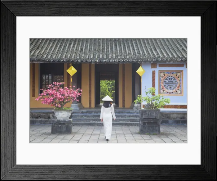 Framed Print : Woman wearing Ao Dai dress at Left House inside Citadel, Hue, Thua Thien-Hue, Vietnam, Indochina, Southeast Asia, Asia Framed Print : Woman wearing Ao Dai dress at Left House inside Citadel, Hue, Thua Thien-Hue, Vietnam, Indochina, Southeast Asia, Asia
