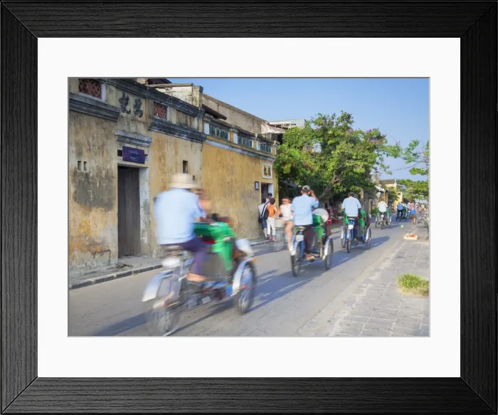 Framed Print : Cyclos passing along street, Hoi An, UNESCO World Heritage Site, Quang Nam, Vietnam, Indochina, Southeast Asia, Asia Framed Print : Cyclos passing along street, Hoi An, UNESCO World Heritage Site, Quang Nam, Vietnam, Indochina, Southeast Asia, Asia