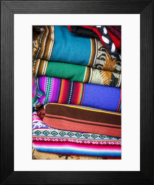 Framed Print : Colorful carpets made of llama and alpaca wool for sale at San Pedro market, Cuzco, Peru