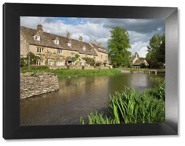 Cotswold stone cottages on the River Eye, Lower Slaughter, Cotswolds, Gloucestershire, England, United Kingdom, Europe