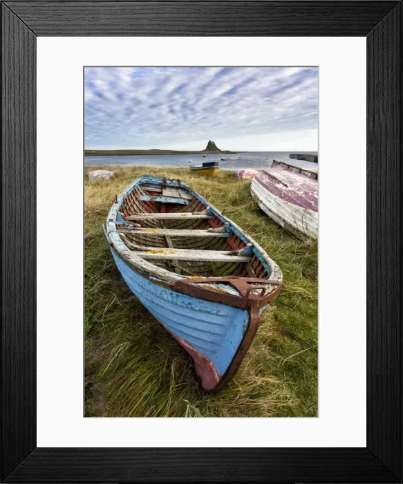 Framed Print : View towards Lindisfarne Castle with an old blue and red fishing boat in the foreground, Lindisfarne (Holy Island), Northumberland, England, United Kingdom, Europe Framed Print : View towards Lindisfarne Castle with an old blue and red fishing boat in the foreground, Lindisfarne (Holy Island), Northumberland, England, United Kingdom, Europe