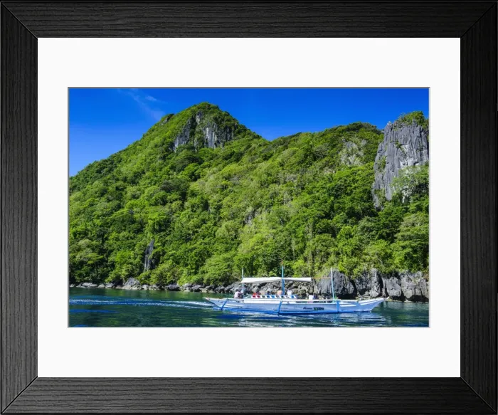 Framed Print : Outrigger boat cruising in the bay of El Nido, Bacuit Archipelago, Palawan, Philippines, Southeast Asia, Asia Framed Print : Outrigger boat cruising in the bay of El Nido, Bacuit Archipelago, Palawan, Philippines, Southeast Asia, Asia
