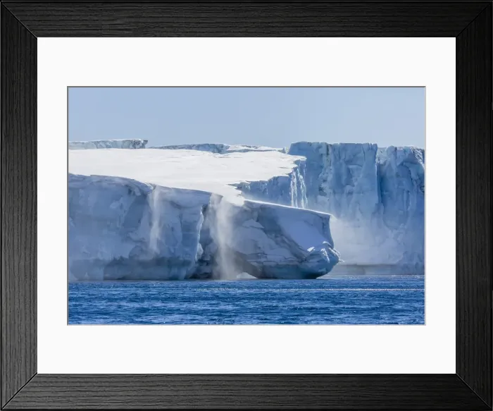 Framed Print : Katabatic winds blow snow into the sea off glacier face at Brown Bluff, Weddell Sea, Antarctica, Polar Regions