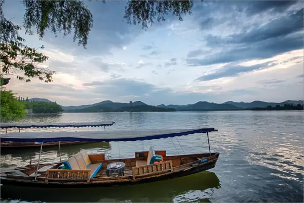 Boats at West Lake shore in Hangzhou, Zhejiang, China, Asia
