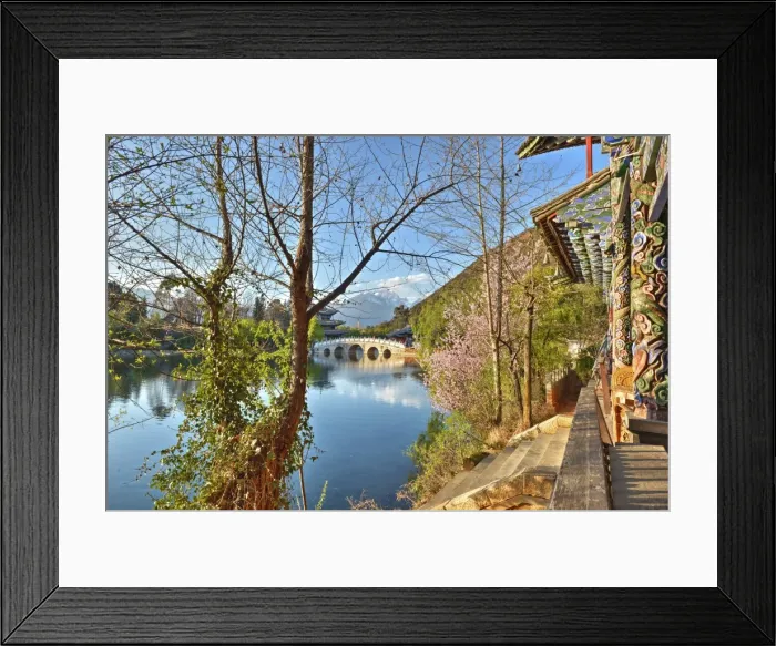 Framed Print : Colourful Yunnan wood carvings with Suocui Bridge and Moon Embracing Pavilion, Lijiang, Yunnan, China, Asia Framed Print : Colourful Yunnan wood carvings with Suocui Bridge and Moon Embracing Pavilion, Lijiang, Yunnan, China, Asia