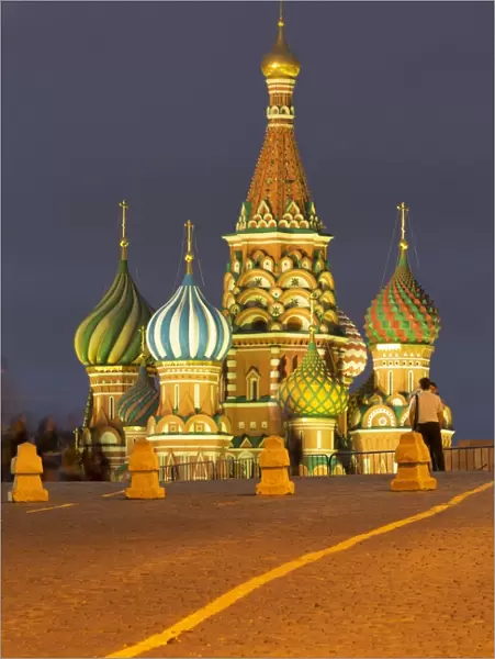 Onion domes of St. Basils Cathedral in Red Square illuminated at night, UNESCO World Heritage Site, Moscow, Russia, Europe