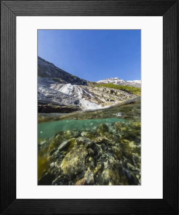 Framed Print : Above and below view of ice melt waterfall cascading down in Svartisen National Park, Melfjord, Nordfjord, Norway, Scandinavia, Europe Framed Print : Above and below view of ice melt waterfall cascading down in Svartisen National Park, Melfjord, Nordfjord, Norway, Scandinavia, Europe