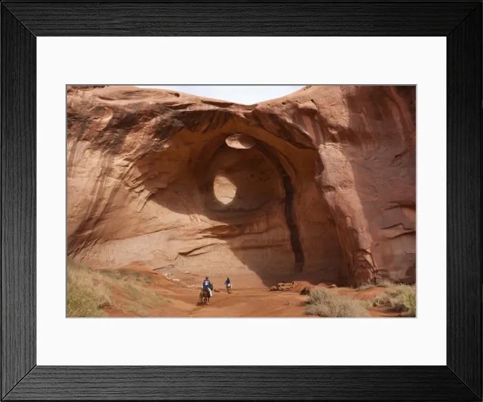 Framed Print : Horse riding trip, tourist with Navajo guide pass under rock arch, Monument Valley Navajo Tribal Park, Utah Arizona, United States of America, North America Framed Print : Horse riding trip, tourist with Navajo guide pass under rock arch, Monument Valley Navajo Tribal Park, Utah Arizona, United States of America, North America