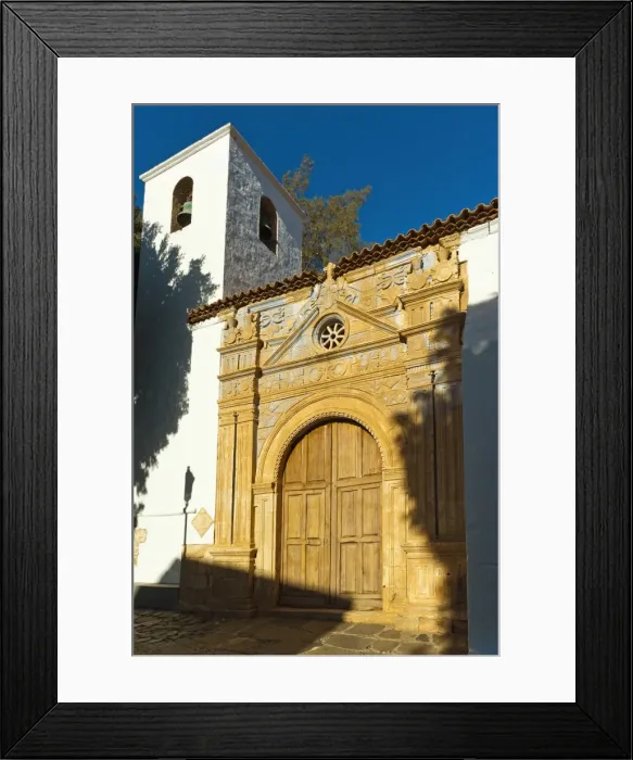 Framed Print : Bell tower and ornate doorway of the late 17th century Church of Nuestra Senora de la Regla, Pajara, Fuerteventura, Canary Islands, Spain, Atlantic, Europe Framed Print : Bell tower and ornate doorway of the late 17th century Church of Nuestra Senora de la Regla, Pajara, Fuerteventura, Canary Islands, Spain, Atlantic, Europe