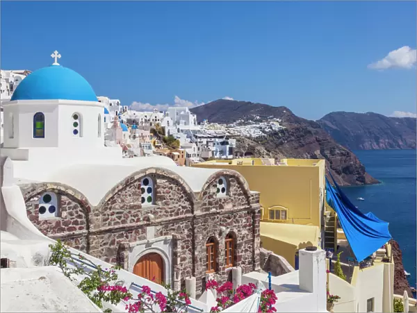 Greek church of St. Nicholas with blue dome, Oia, Santorini (Thira), Cyclades Islands, Greek Islands, Greece, Europe