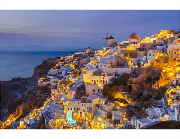 Windmill and traditional houses after sunset, Oia, Santorini (Thira), Cyclades Islands, Greek Islands, Greece, Europe