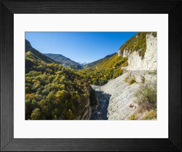 Framed Print : Road leading through a beautiful gorge on the Argun River in the mountains of Chechnya, Caucasus, Russia, Europe Framed Print : Road leading through a beautiful gorge on the Argun River in the mountains of Chechnya, Caucasus, Russia, Europe