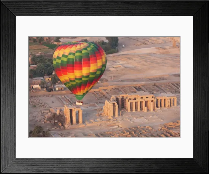 Framed Print : A hot air balloon flight over a ruined temple near Luxor, Thebes, Egypt, North Africa, Africa Framed Print : A hot air balloon flight over a ruined temple near Luxor, Thebes, Egypt, North Africa, Africa