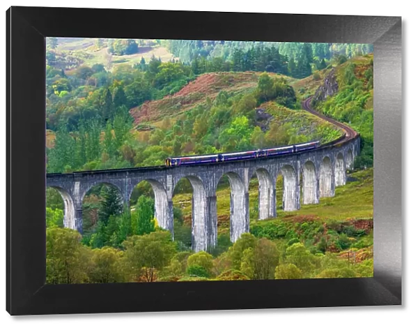 Train on the Glenfinnan Railway Viaduct, part of the West Highland Line, Glenfinnan, Loch Shiel, Highlands, Scotland, United Kingdom, Europe