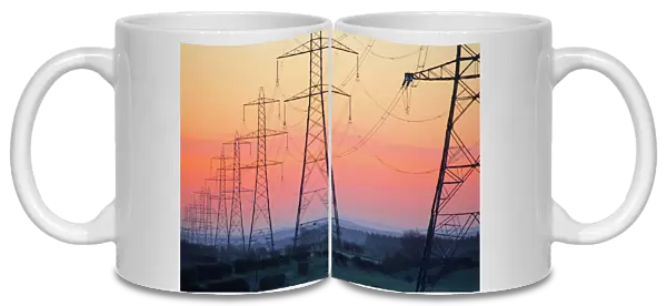 Electricity pylons at daybreak, Derbyshire  /  Nottinghamshire border, England, United Kingdom, Europe
