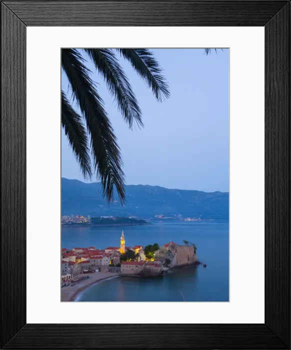 Framed Print : Elevated view over Budvas picturesque Stari Grad (Old Town) illuminated at dusk, Budva, Montenegro, Europe Framed Print : Elevated view over Budvas picturesque Stari Grad (Old Town) illuminated at dusk, Budva, Montenegro, Europe