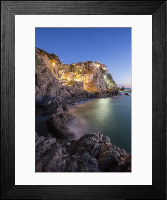 Framed Print : Blue hour in the little village of Manarola with its pastel coloured houses in the Cinque Terre National Park, UNESCO World Heritage Site, Liguria, Italy, Europe Framed Print : Blue hour in the little village of Manarola with its pastel coloured houses in the Cinque Terre National Park, UNESCO World Heritage Site, Liguria, Italy, Europe