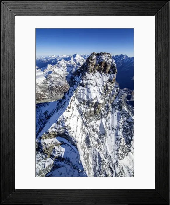 Framed Print : The massive shape of the Matterhorn sorrounded by its mountain range covered in snow, Swiss Canton of Valais, Swiss Alps, Switzerland, Europe Framed Print : The massive shape of the Matterhorn sorrounded by its mountain range covered in snow, Swiss Canton of Valais, Swiss Alps, Switzerland, Europe