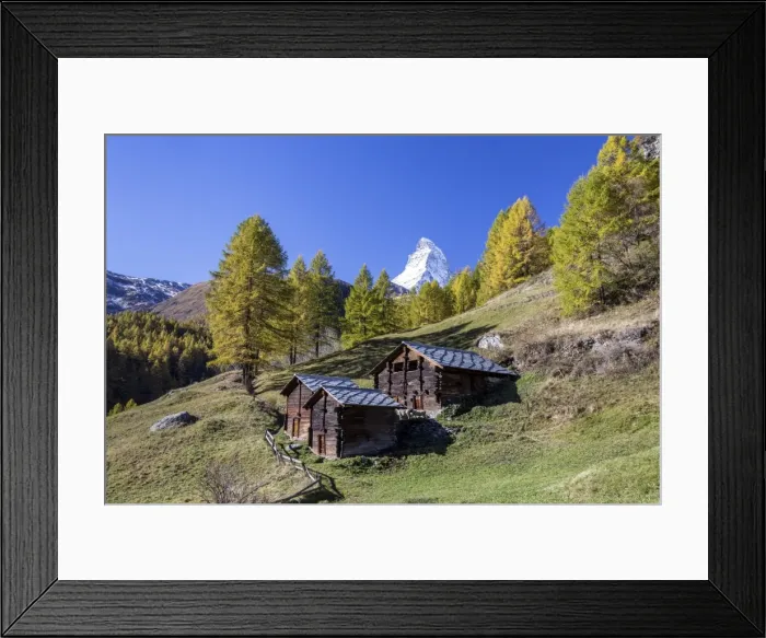 Framed Print : The unique shape of the Matterhorn seen from a little group of mountain huts by Zermatt, Swiss Canton of Valais, Swiss Alps, Switzerland, Europe Framed Print : The unique shape of the Matterhorn seen from a little group of mountain huts by Zermatt, Swiss Canton of Valais, Swiss Alps, Switzerland, Europe