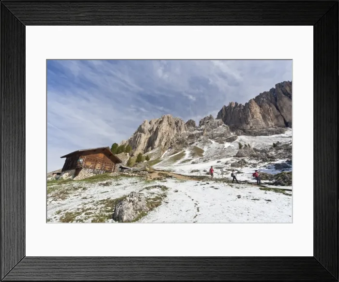 Framed Print : Hikers walking along the trail at the foot of the Sassolungo and Sassopiatto after a snowfall during springtime, Trentino-Alto Adige, Italy, Europe Framed Print : Hikers walking along the trail at the foot of the Sassolungo and Sassopiatto after a snowfall during springtime, Trentino-Alto Adige, Italy, Europe