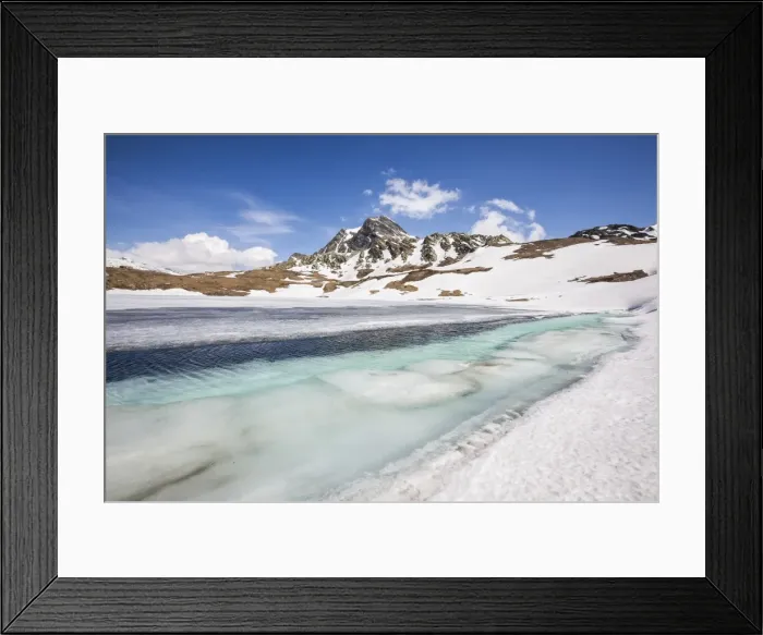 Framed Print : Spring is coming and lake Emet in the Spluga Valley is slowly thawing, Lombardy, Italy, Europe Framed Print : Spring is coming and lake Emet in the Spluga Valley is slowly thawing, Lombardy, Italy, Europe