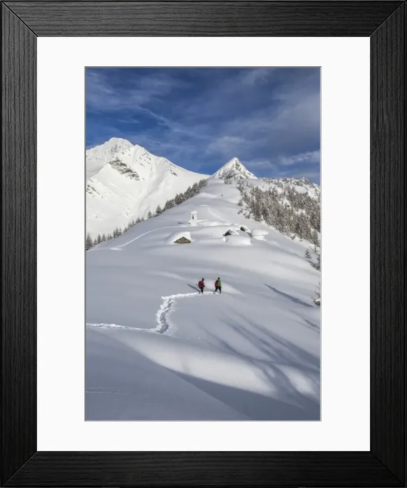 Framed Print : Hikers trying to approach the little village at the Scima Alp covered in snow, Valchiavenna, Lombardy, Italy, Europe Framed Print : Hikers trying to approach the little village at the Scima Alp covered in snow, Valchiavenna, Lombardy, Italy, Europe