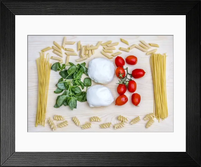 Framed Print : Composition with the bright colours of Italian food: pasta, spaghetti, tomatoes from Sicily, mozzarella from Naples and basil, Italy, Europe Framed Print : Composition with the bright colours of Italian food: pasta, spaghetti, tomatoes from Sicily, mozzarella from Naples and basil, Italy, Europe
