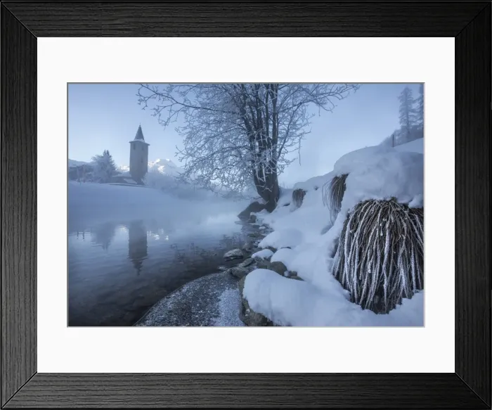 Framed Print : Ice and frost covering the banks of River Inn in Lower Engadine, the morning mist hiding the bell tower of the church in Sils, Graubunden, Switzerland, Europe Framed Print : Ice and frost covering the banks of River Inn in Lower Engadine, the morning mist hiding the bell tower of the church in Sils, Graubunden, Switzerland, Europe