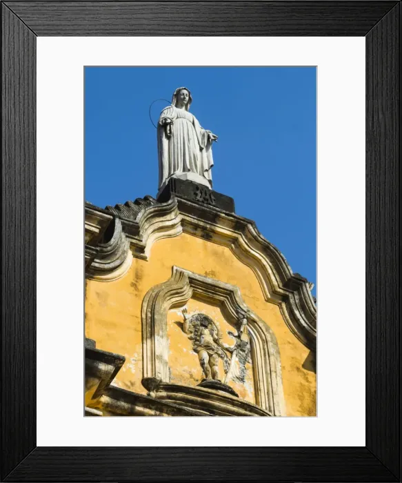 Framed Print : Statue atop the baroque facade of the Iglesia de la Recoleccion church, built 1786, in this historic northwest city, Leon, Nicaragua, Central America Framed Print : Statue atop the baroque facade of the Iglesia de la Recoleccion church, built 1786, in this historic northwest city, Leon, Nicaragua, Central America