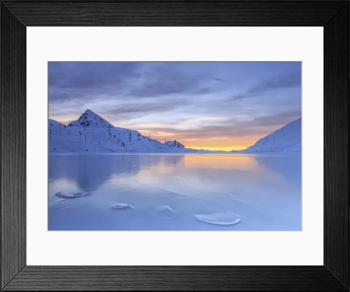 Framed Print : The colors of dawn invading the smooth surface of Lago Bianco exceptionally icy, Bernina Pass, Graubunden, Swiss Alps, Switzerland, Europe