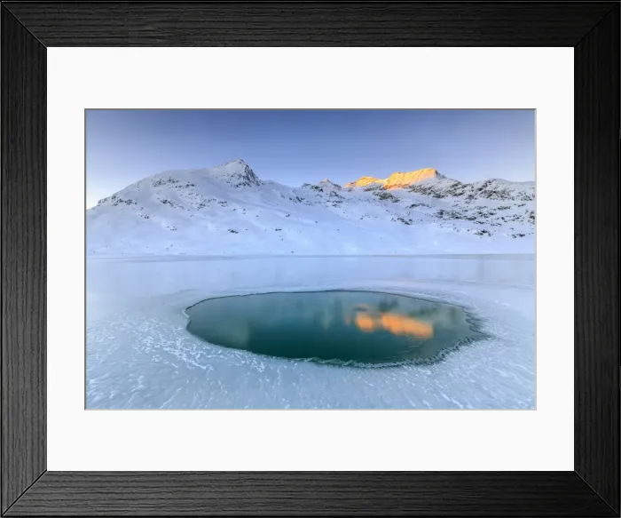 Framed Print : The Piz Cambrena illuminated by the sun reflecting in a pool surrounded by ice at the Bernina, Graubunden, Swiss Alps, Switzerland, Europe Framed Print : The Piz Cambrena illuminated by the sun reflecting in a pool surrounded by ice at the Bernina, Graubunden, Swiss Alps, Switzerland, Europe