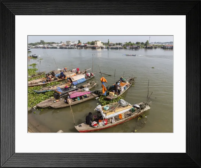 Framed Print : Families in their river boats at the local market in Chau Doc, Mekong River Delta Framed Print : Families in their river boats at the local market in Chau Doc, Mekong River Delta