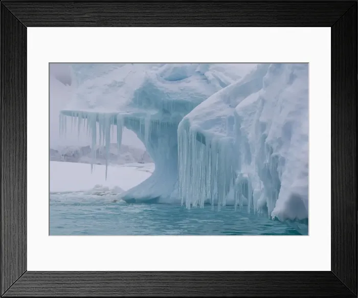 Framed Print : Wind and water sculpted iceberg with icicles at Booth Island, Antarctica, Polar Regions Framed Print : Wind and water sculpted iceberg with icicles at Booth Island, Antarctica, Polar Regions