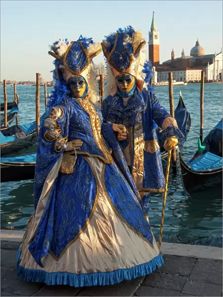 Two ladies in blue and gold masks, Venice Carnival, Venice, UNESCO World Heritage Site