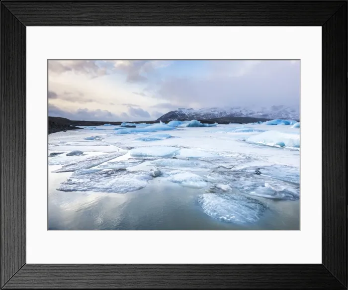 Framed Print : Frozen icebergs locked in the frozen waters of Fjallsarlon Glacier lagoon, South East Iceland Framed Print : Frozen icebergs locked in the frozen waters of Fjallsarlon Glacier lagoon, South East Iceland