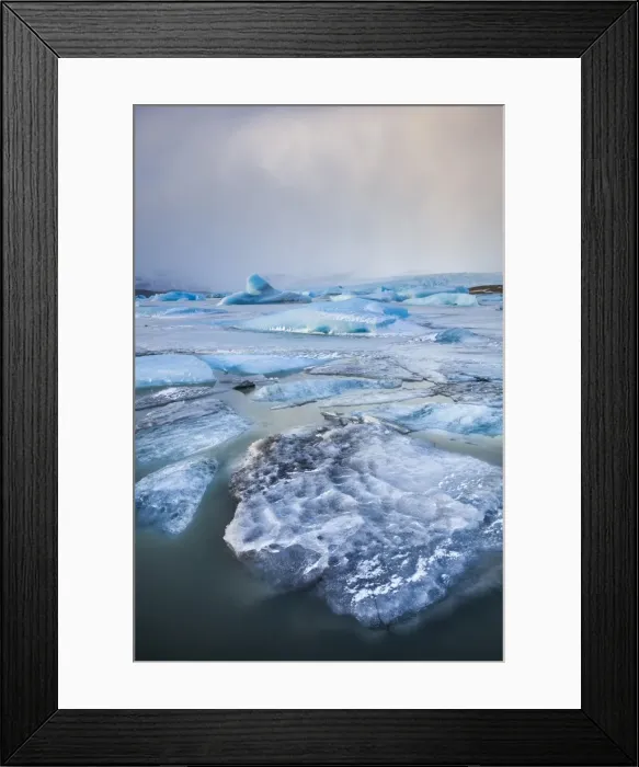 Framed Print : Frozen icebergs locked in the frozen waters of Fjallsarlon Glacier lagoon, South East Iceland Framed Print : Frozen icebergs locked in the frozen waters of Fjallsarlon Glacier lagoon, South East Iceland